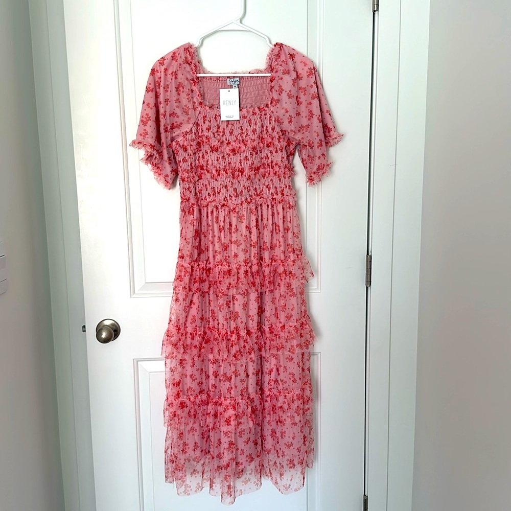 NWT Size Medium Pink floral ruffle dress. bought from Henly.